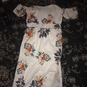 Beautiful dress. Never worn. Off shoulder. Chiffon lining. Zipper side. Flowy